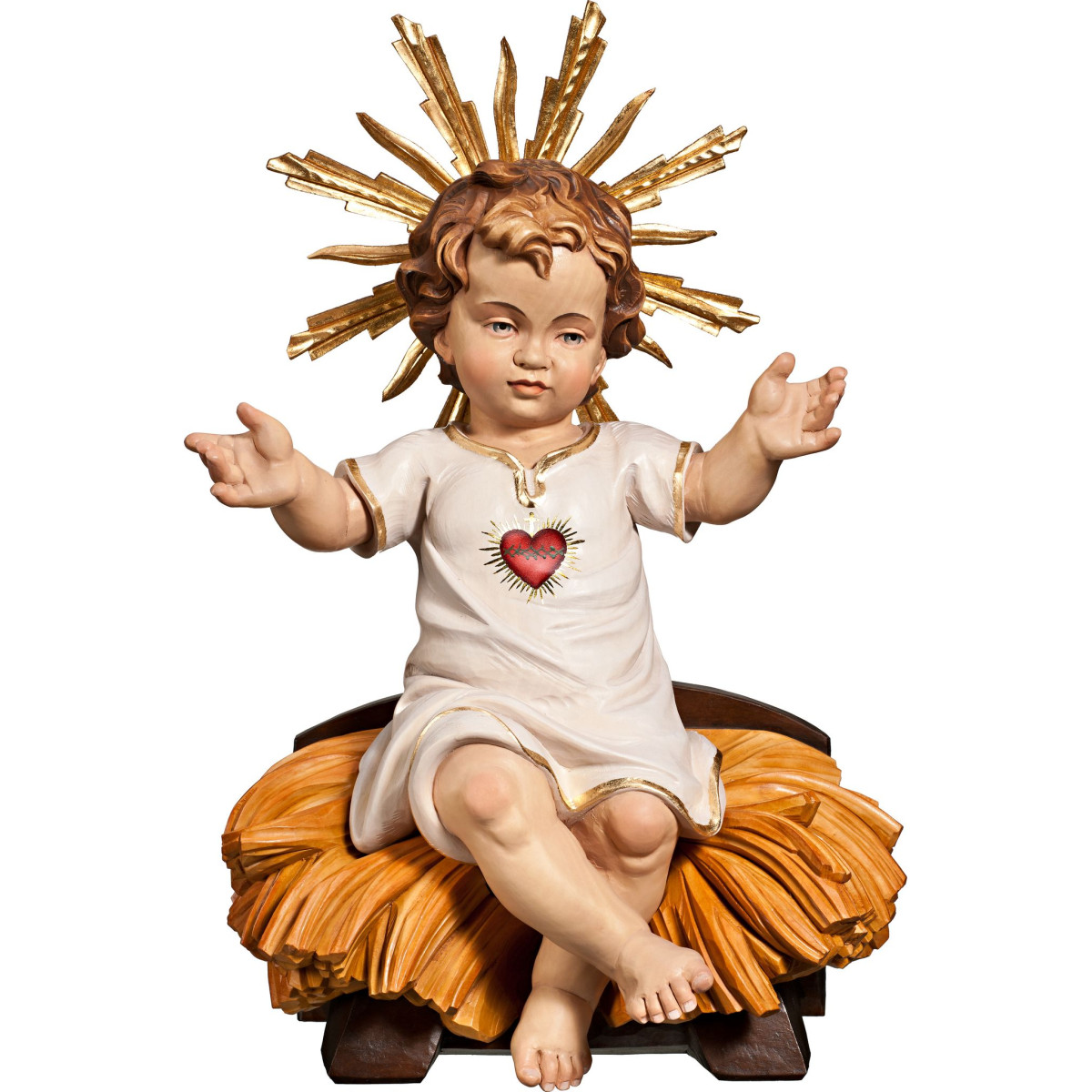 Niño Jesús vestido con Corazón sentado en cuna